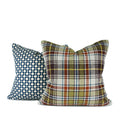 Blue geometric decorative pillow paired with green plaid throw pillow, hand-sewn by Liz Saintsing in Charlotte North Carolina