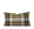 Blue geometric lumbar pillow paired with green plaid throw pillow, hand-sewn by Liz Saintsing in Charlotte North Carolina