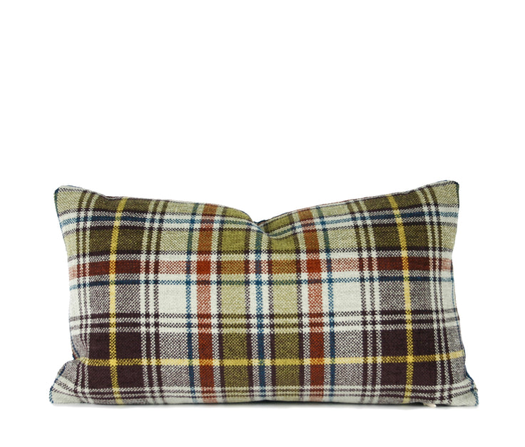 Blue geometric lumbar pillow paired with green plaid throw pillow, hand-sewn by Liz Saintsing in Charlotte North Carolina
