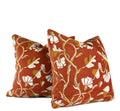 Hand-sewn rust floral throw pillow with ivory and gold detailing by Liz Saintsing in Charlotte North Carolina