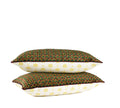Green and plum geometric decorative lumbar pillow with ivory floral reverse, shown front and back, hand-sewn in Charlotte, North Carolina