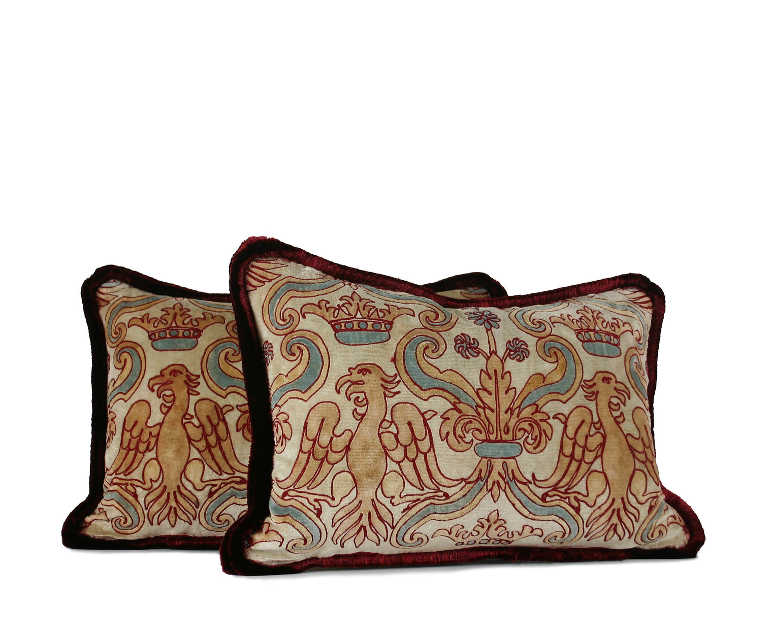 Decorative lumbar pillow made from a 1940s Italian velvet textile with heraldic motifs and burgundy silk fringe hand-sewn by Liz Saintsing in Charlotte North Carolina