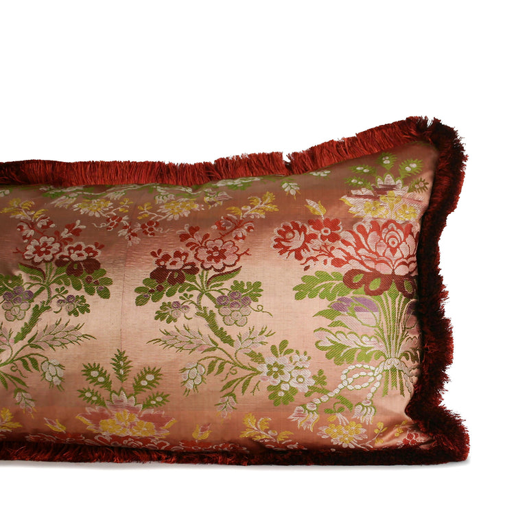 Luxury decorative lumbar pillow made from a rare 1720s French silk textile with floral motifs and silk brush fringe, hand-sewn by Liz Saintsing in Charlotte, North Carolina.