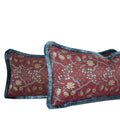 French silk lumbar pillow dating to the 1950s, featuring woven floral motifs and luxurious blue silk brush fringe, hand-sewn by Liz Saintsing in Charlotte, North Carolina.
