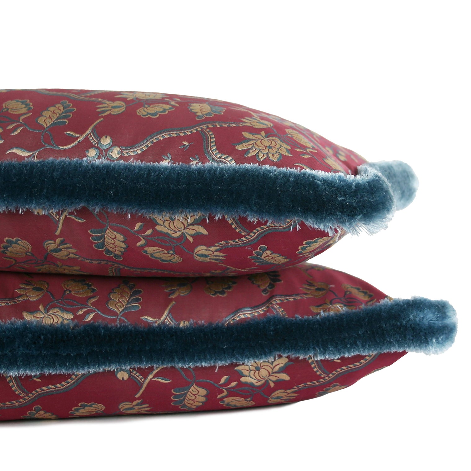French silk lumbar pillow dating to the 1950s, featuring woven floral motifs and luxurious blue silk brush fringe, hand-sewn by Liz Saintsing in Charlotte, North Carolina.