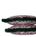 Handcrafted mauve lumbar pillow with abstract woven pattern and deep emerald brush fringe, individually sewn by Liz Saintsing in Charlotte, North Carolina.