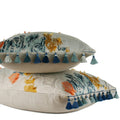 Painterly woven decorative lumbar pillow in blue, coral and ochre with graduated blue tassel fringe. Hand-sewn in Charlotte NC by Liz Saintsing.