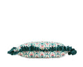 Teal and pink floral decorative lumbar pillow with contrast striped ruffle trim side view hand-sewn in Charlotte North Carolina