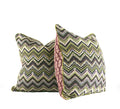 Green chevron tapestry decorative throw pillow with plum floral reverse and contrast leather welt side detail view hand-sewn in Charlotte North Carolina
