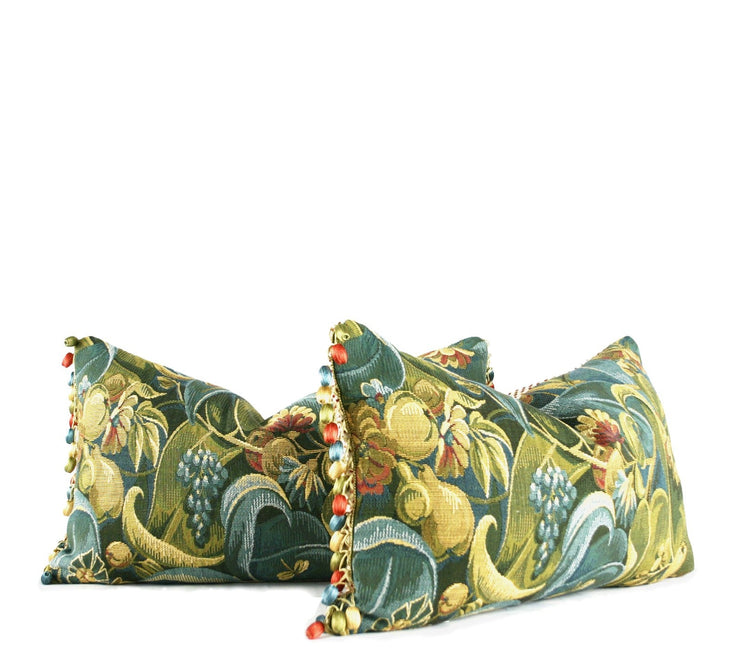 Green botanical tapestry decorative throw pillow with bird and floral motif and multicolor beaded trim hand-sewn in Charlotte North Carolina