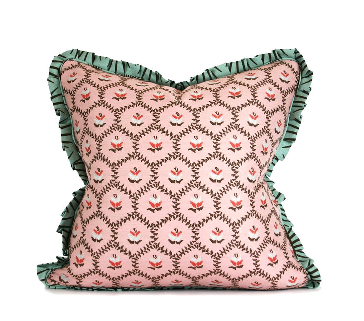 Blush floral decorative throw pillow with teal contrast ruffle trim hand-sewn by Liz Saintsing in Charlotte North Carolina
