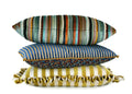 Multicolor vertical stripe lumbar pillow stack with teal rust and mustard tones hand-sewn in Charlotte NC